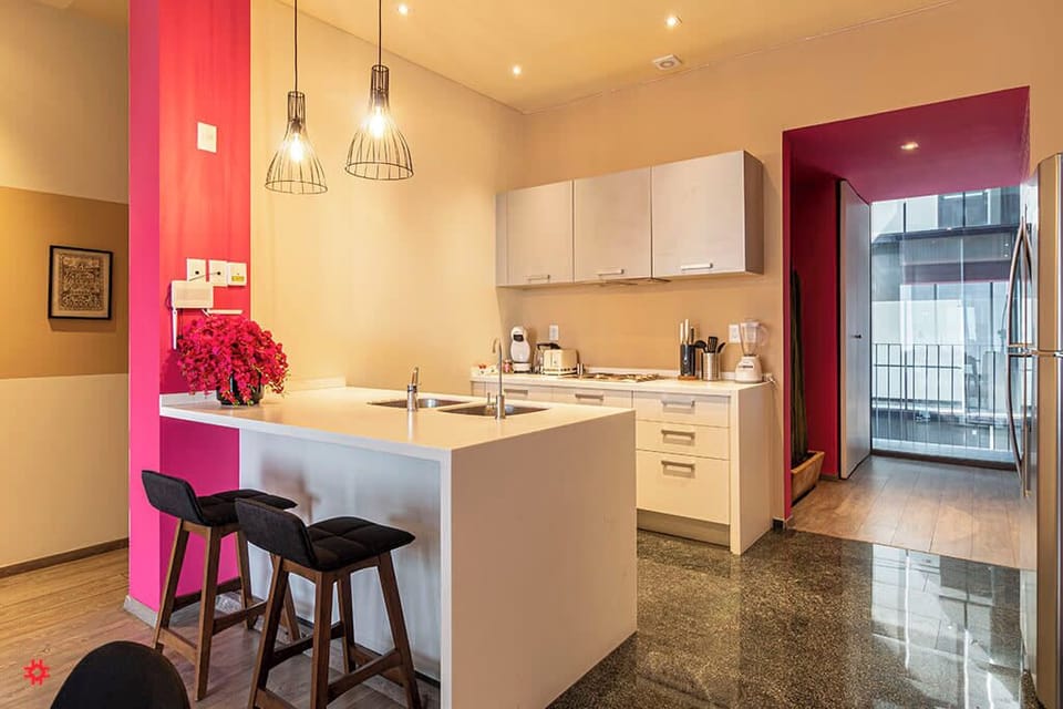The building contains several similar units, Furniture, decor, and amenities may vary