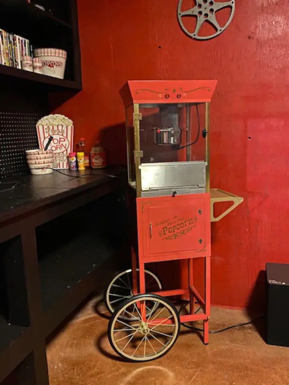 Movie theater in the basement... complete with a popcorn machine!