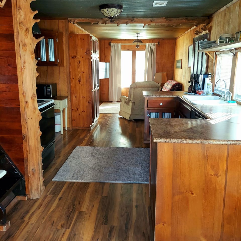 Stepping into the cottage.