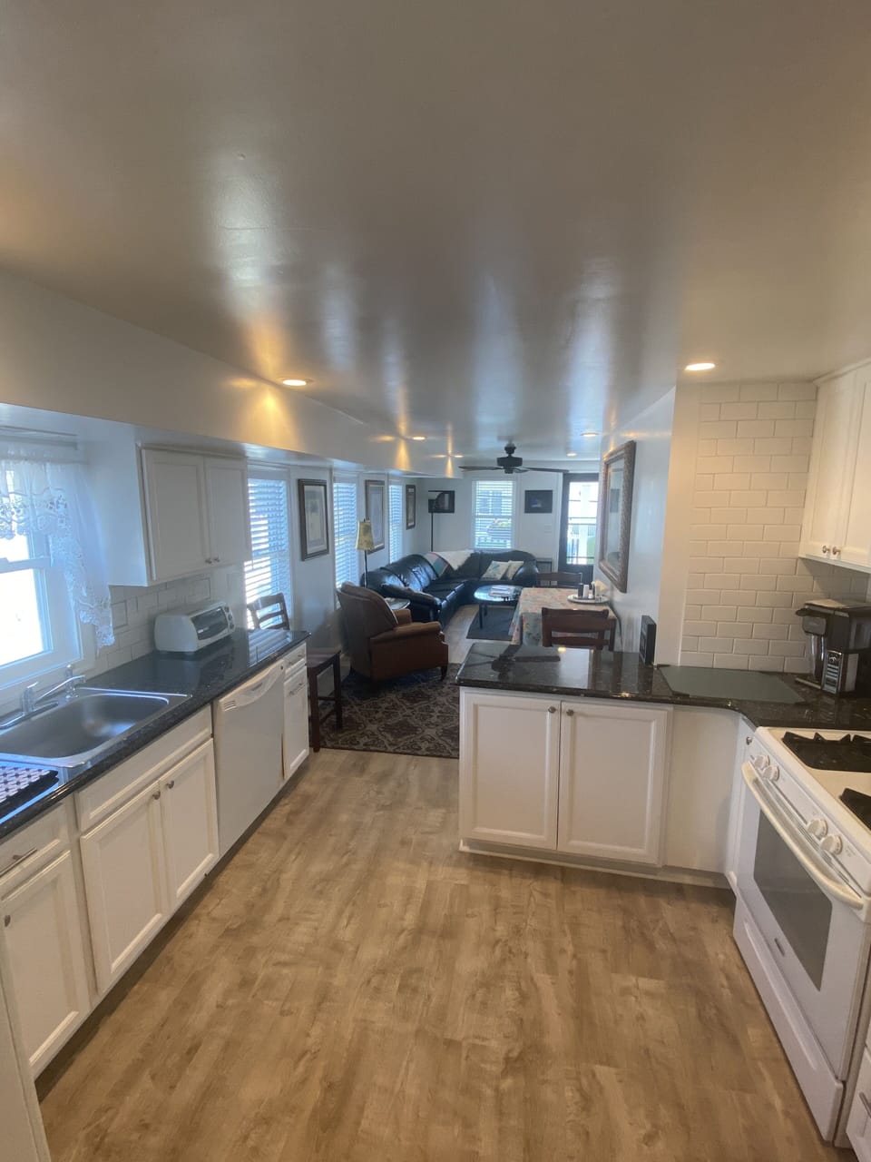 Kitchen looking into living room