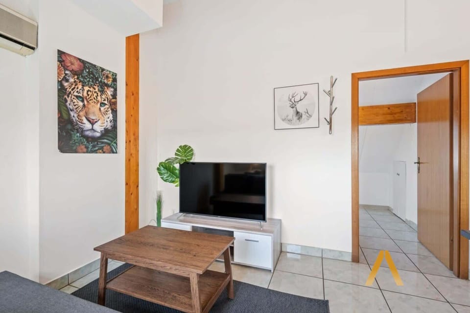 Charming & Functional Space – The open layout seamlessly connects the kitchen, dining, and living areas for a cozy yet spacious feel.