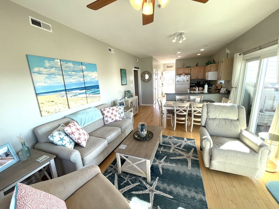 Living area with newer furniture. Southern facing with plenty of natural light!