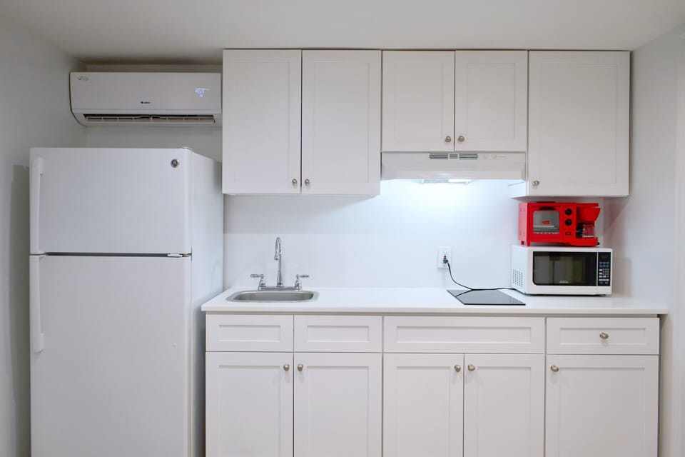 Kitchen with 2-range electric stove