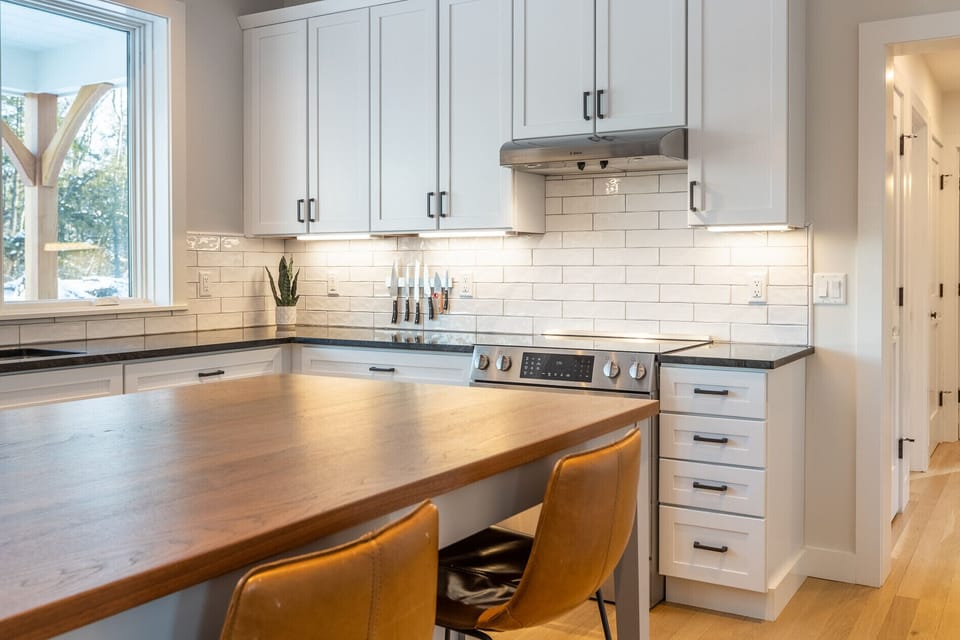 Kitchen is fully stocked with all the bar and cookware you could possibly need.