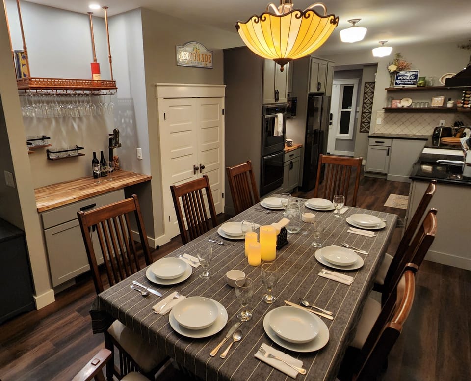 Seating for 8 with additional folding chairs (4) in laundry room