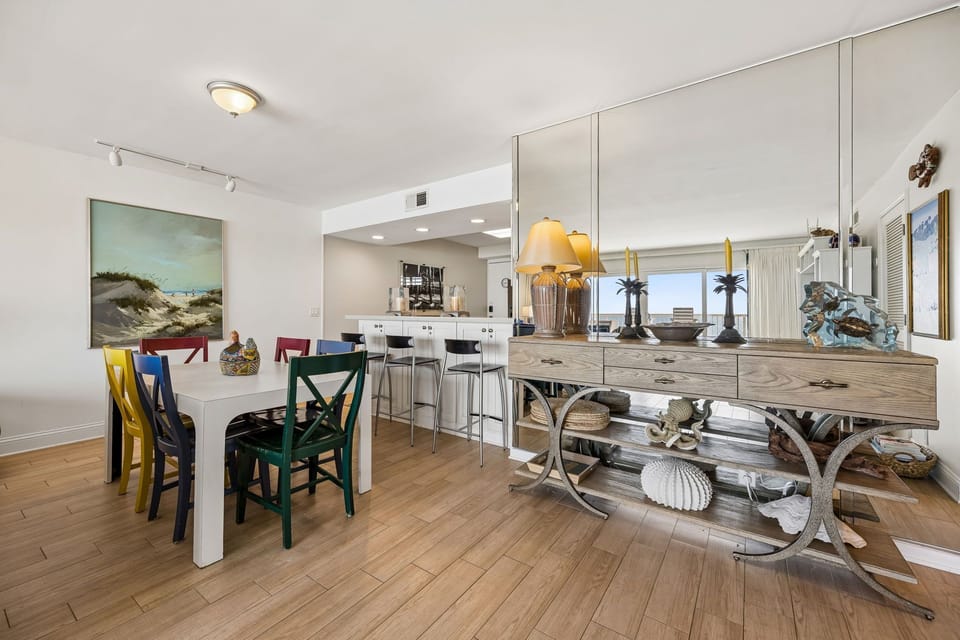 Step into your coastal haven where beach-inspired charm meets open-concept living. Gather around the cheerful dining table, unwind at the stylish breakfast bar, and let ocean breezes sweep through your home.