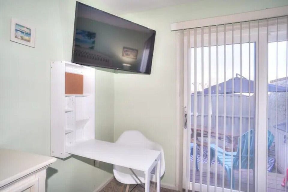 Master bedroom with pull-out workspace.