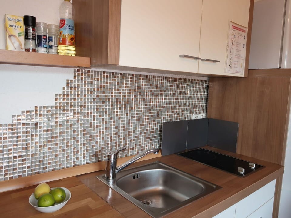 Tap, Kitchen Sink, Countertop, Plumbing Fixture, Property, Sink, Cabinetry, Kitchen, Wood, Tableware