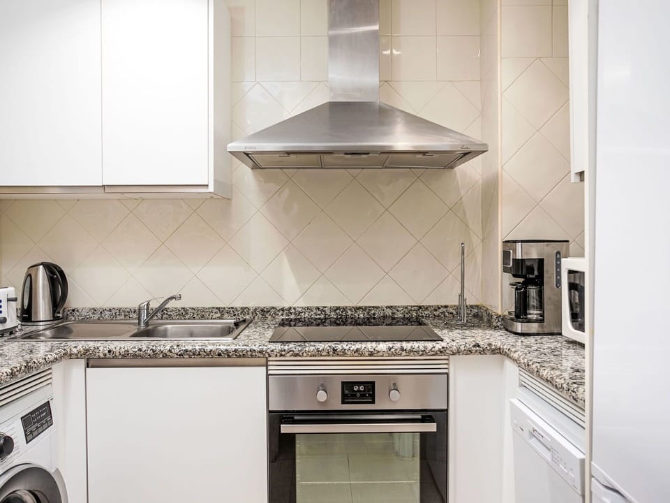 Kitchen, Kitchen Appliance, Countertop, Major Appliance, Flooring, Kitchen Stove, Interior Design, Home Appliance, Stove, Gas Stove