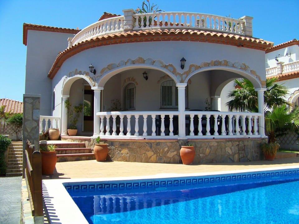 Water, Plant, Sky, Property, Furniture, Swimming Pool, Azure, Outdoor Furniture, Shade, Building