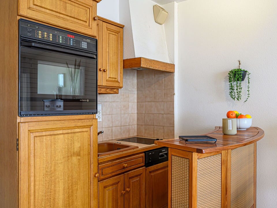 Cabinetry, Furniture, Wood, Kitchen, Countertop, Flooring, Interior Design, Cupboard, Kitchen Appliance, Floor
