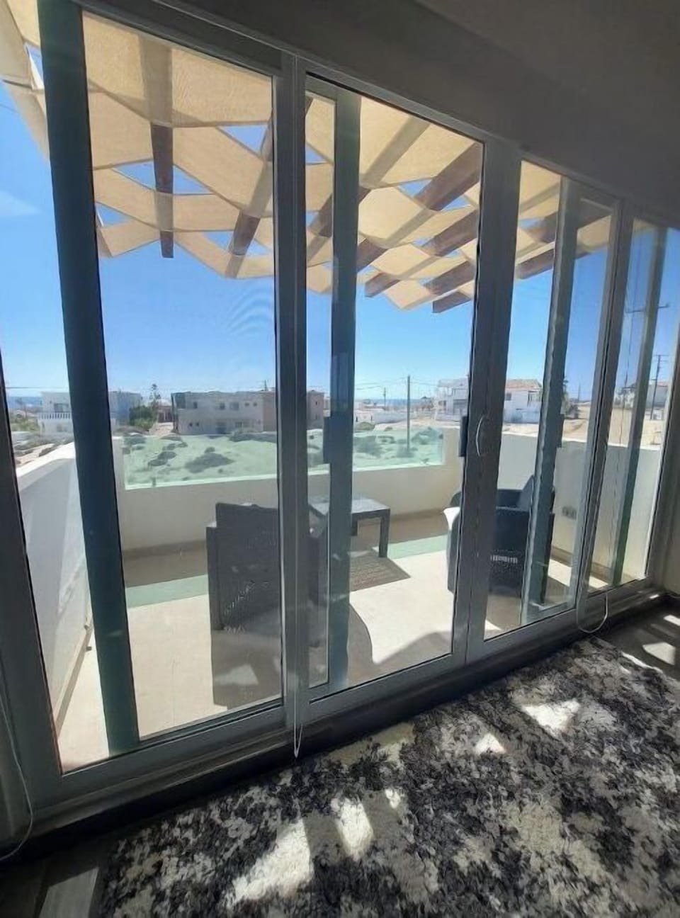 Balcony right outside of living room - perfect for morning coffee or a nightcap.