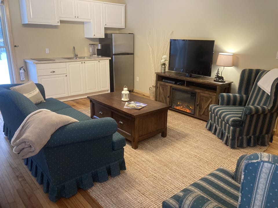 Spacious living area with kitchenette gives options for enjoying Muskoka