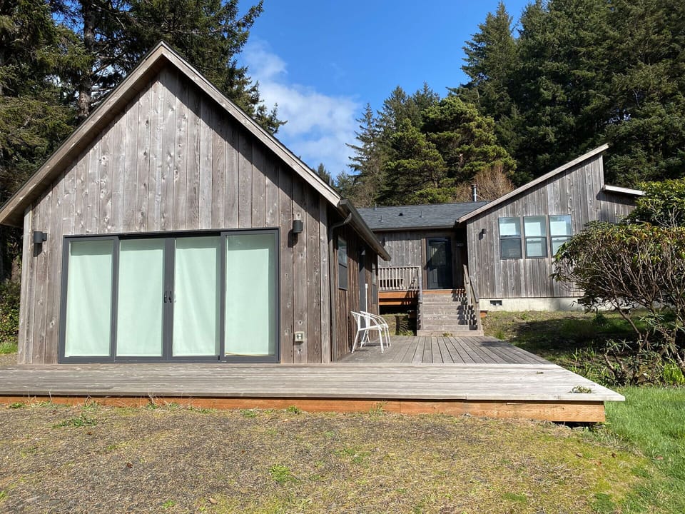Front exterior walkway is shared with the main house which is rented separately.