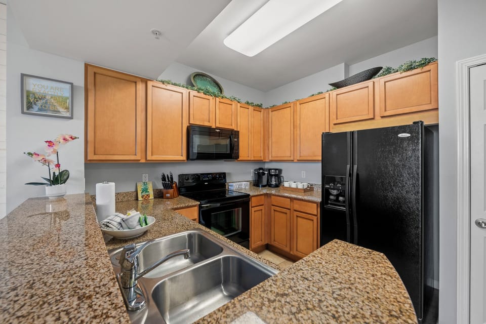 Stainless Steel Sink and Dishwasher:  All the comforts of home!