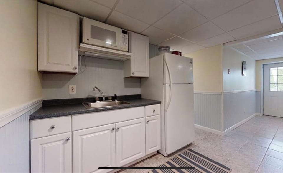 lower level kitchenette, perfect for easy patio grilling and serving 