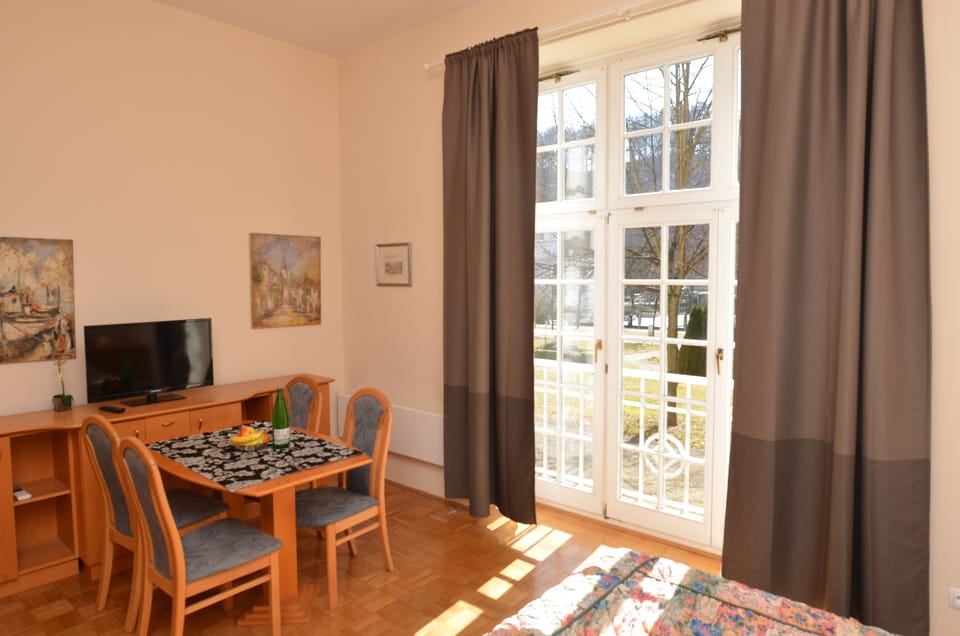 Living room. Drink  tea or coffee while having a relaxing view of the park