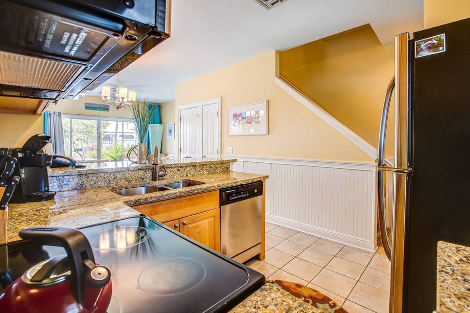 Plenty of natural light graces the first floor, creating a bright and inviting atmosphere for your stay.