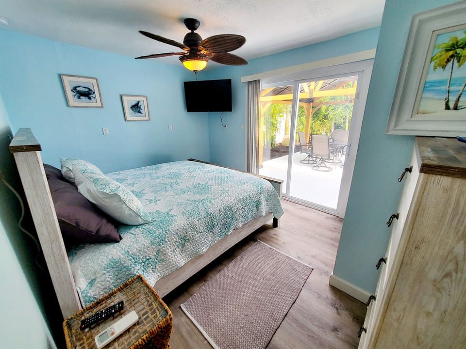 Master bedroom with king bed and en-suite bathroom.