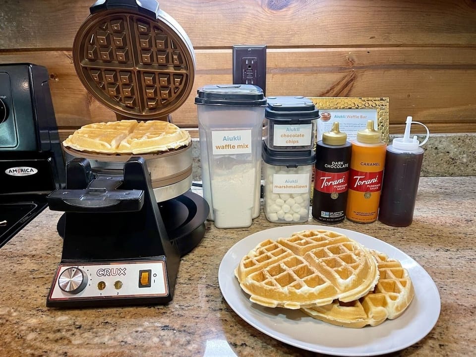 Enjoy our complimentary waffle bar that will make your family smile.