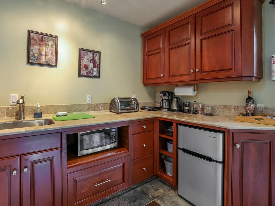 Kitchen has coffee or tea, plenty of space to have a great meal too