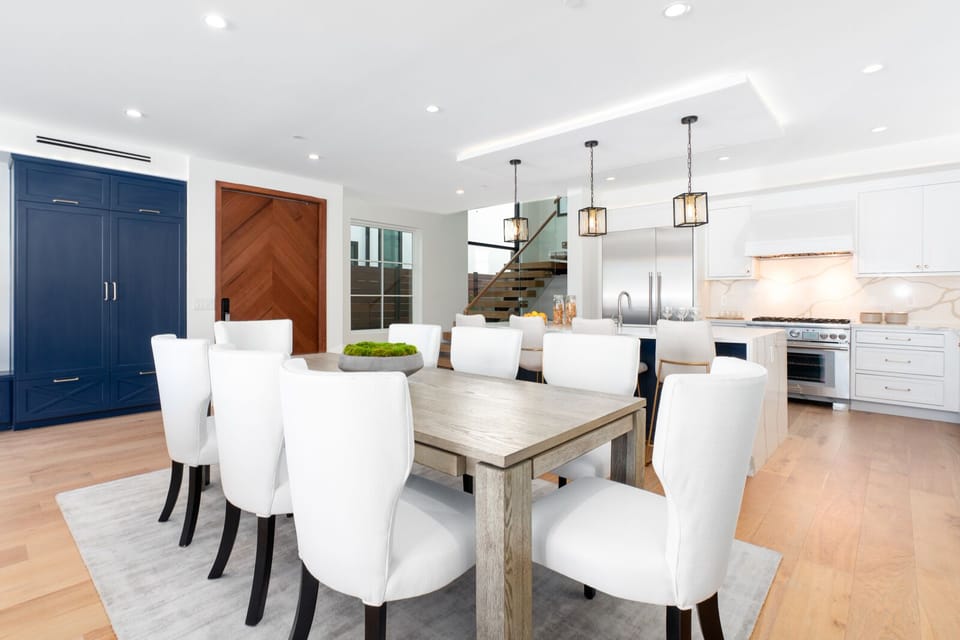Dining room and kitchen facing the front door. 