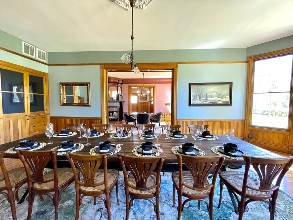 Custom reclaimed redwood dining table that seats 12 guests.