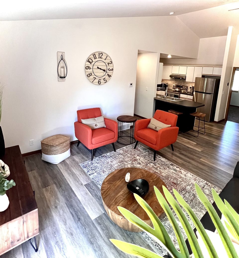 Great Room Area with Cathedral Ceilings and Kitchen Counter Seating