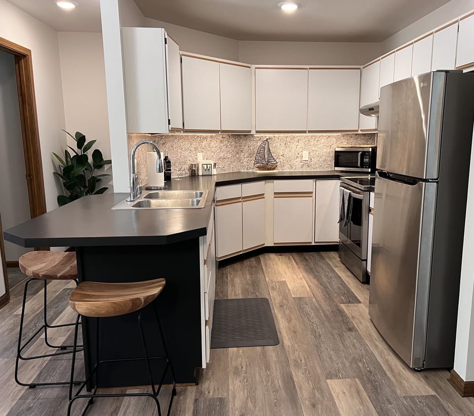 Fully Stocked Kitchen with New Appliances 