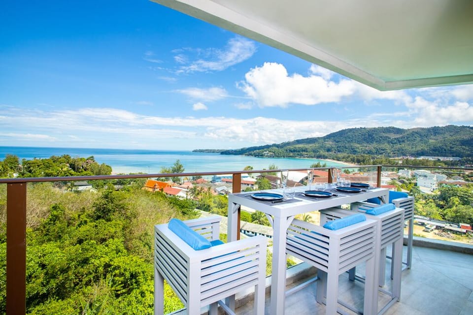 large terrace with modern dining area.
