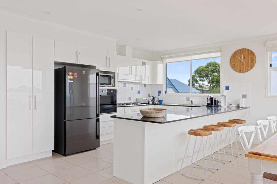Open plan kitchen area with bench seating