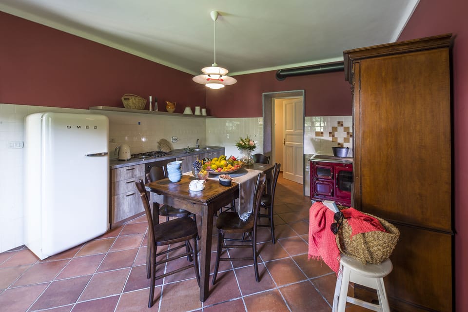 kitchen with freezer, bridge, dishwasher, Wood stove
