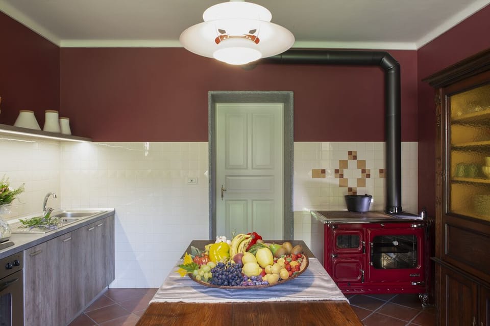 kitchen with freezer, bridge, dishwasher, Wood stove