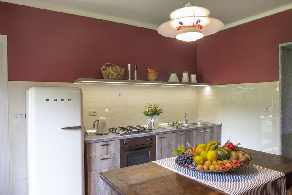 kitchen with freezer, bridge, dishwasher, Wood stove