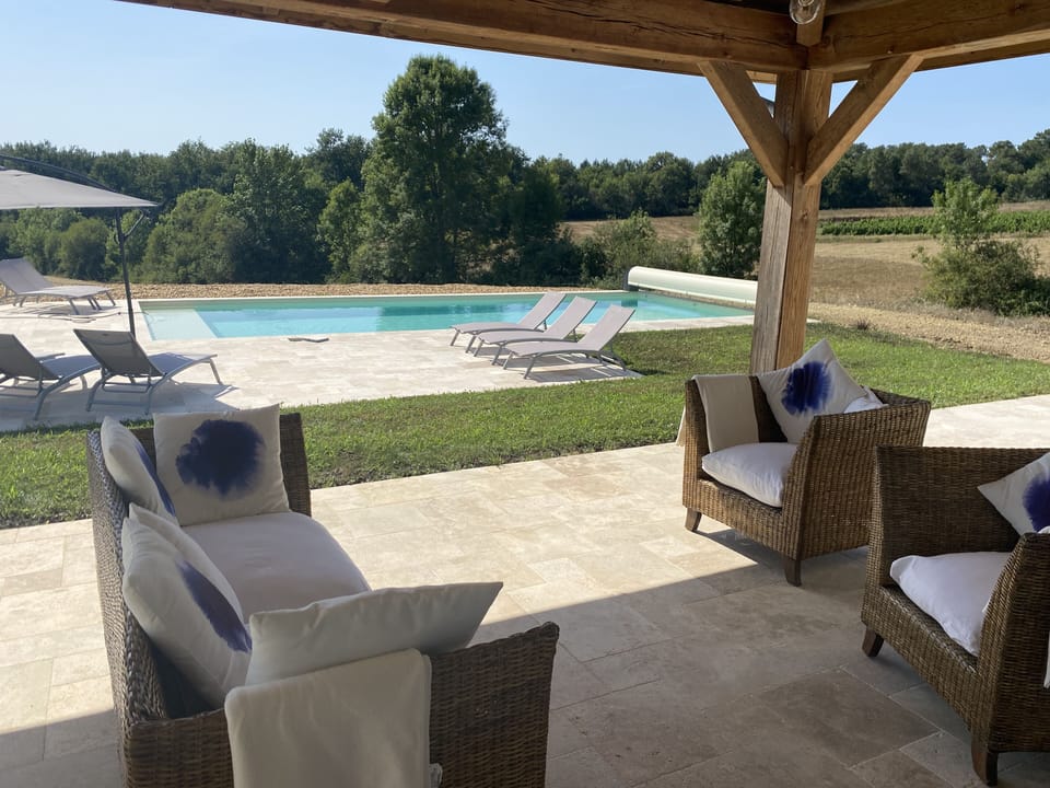 Terrace, Heated Pool, outdoor kitchen and eating areas.
