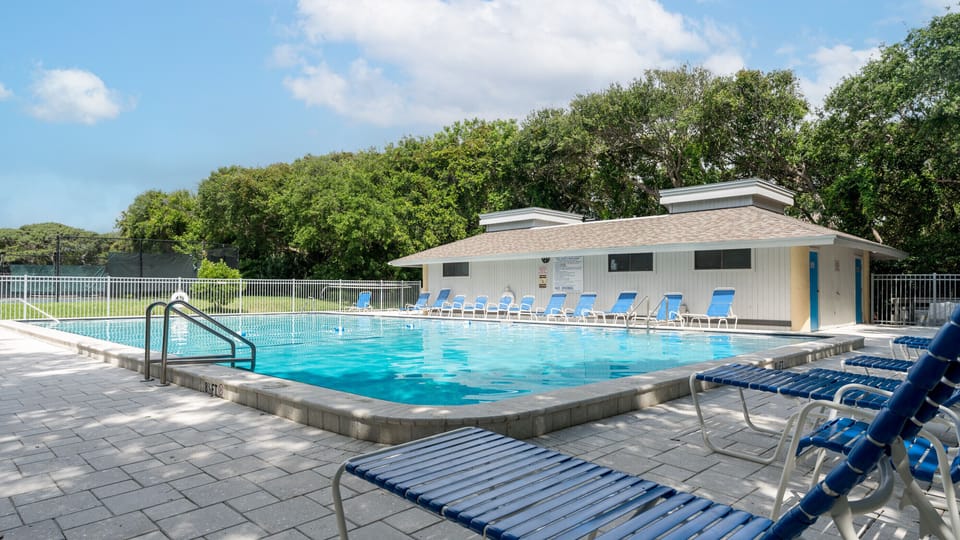 Pool 1 is steps away from the condo. 