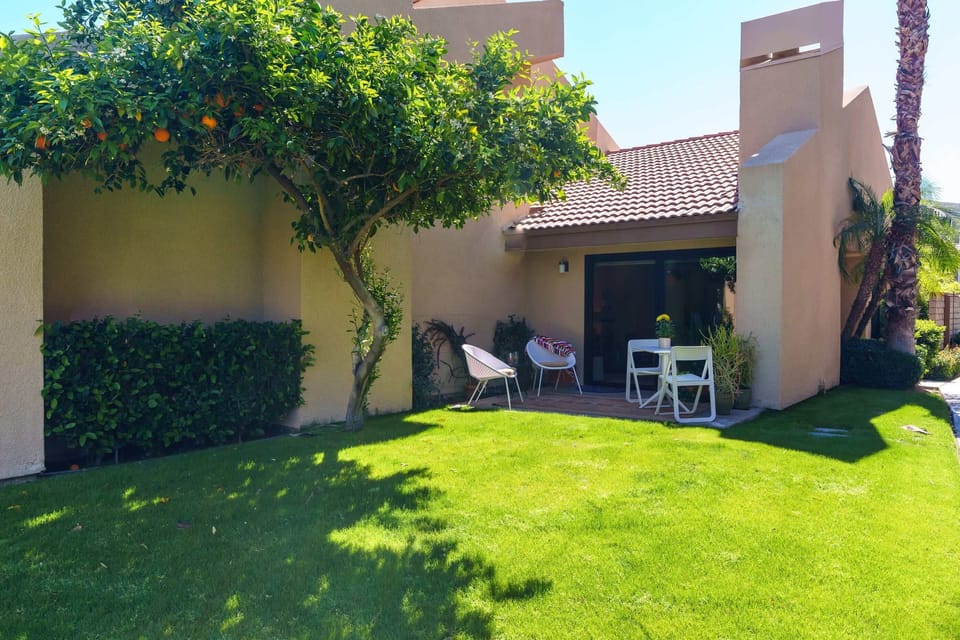 Unwind on the outdoor patio seating. Enjoy the perfect blend of shade and sunshine while sipping your favorite drink. This serene spot is ideal for relaxation, conversation, or soaking up the view. Your private oasis awaits!