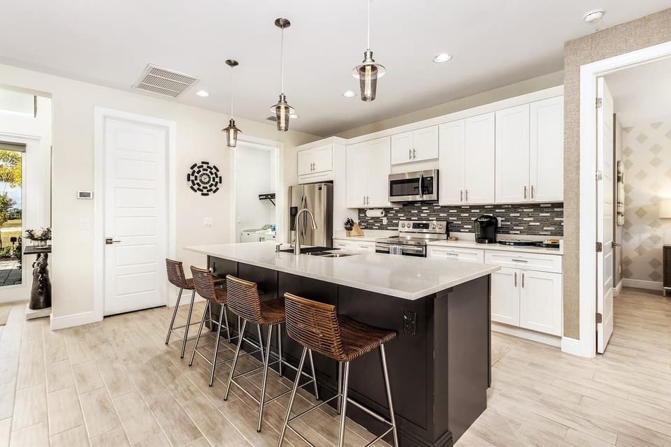 Kitchen, door to pantry and laundry.