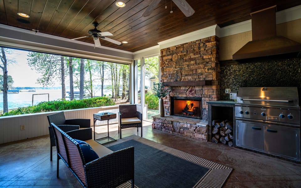 Outdoor gas grill and wood fireplace