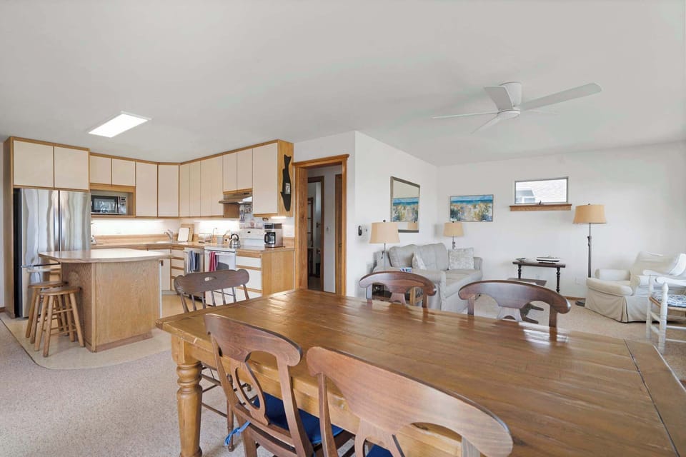 Open-concept main floor with panoramic lagoon views