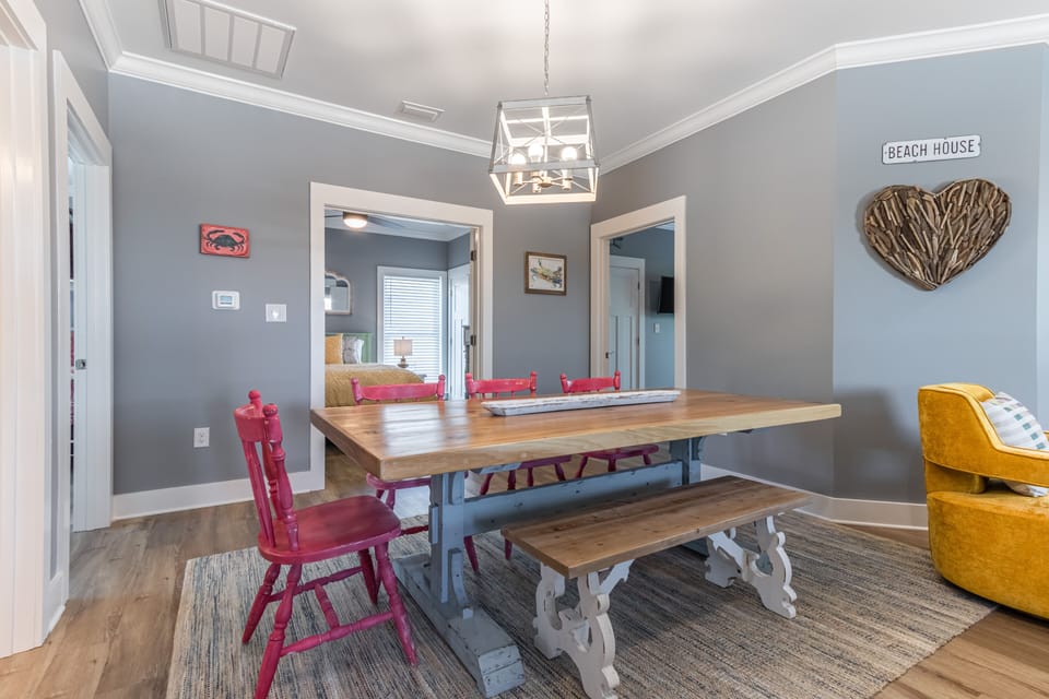 Dining Area - An open dining area, which includes a table with seating up to 6, is provided. This is a great space for enjoying meals together but is also great for visiting and playing games.