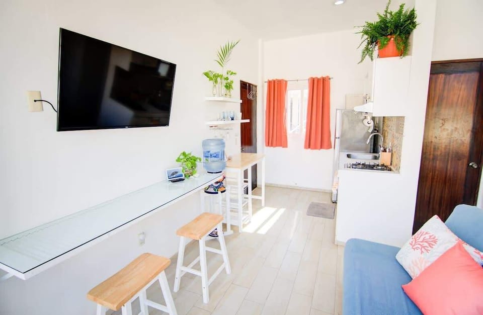 Fully equipped kitchen and a comfortable, laptop-friendly workspace