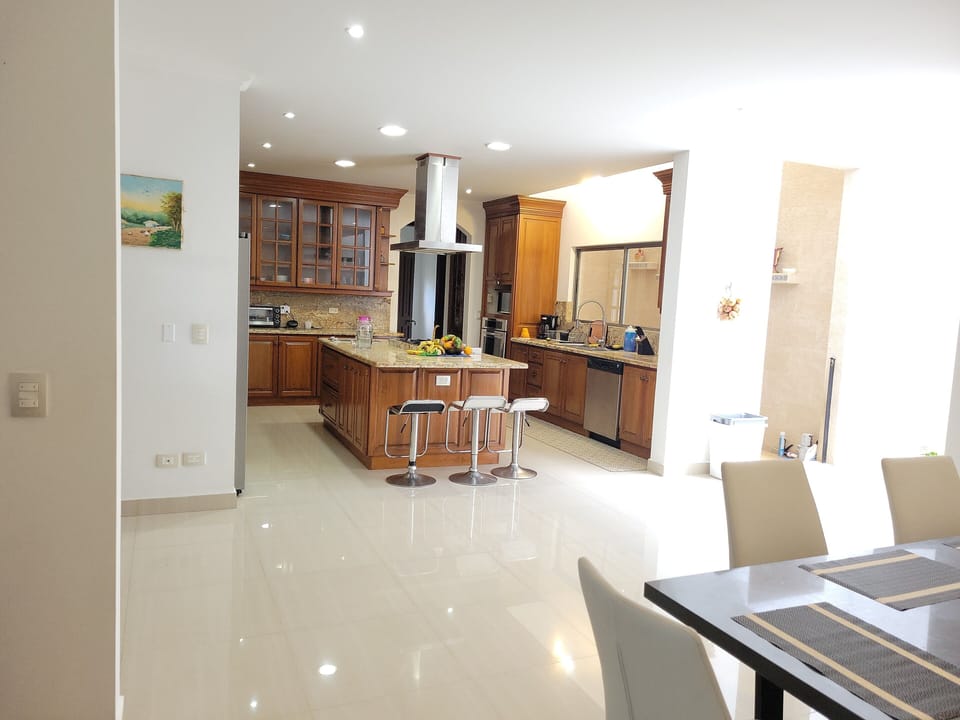 Spacious kitchen, seating for 11.  Formal dining room for 8 in next photo