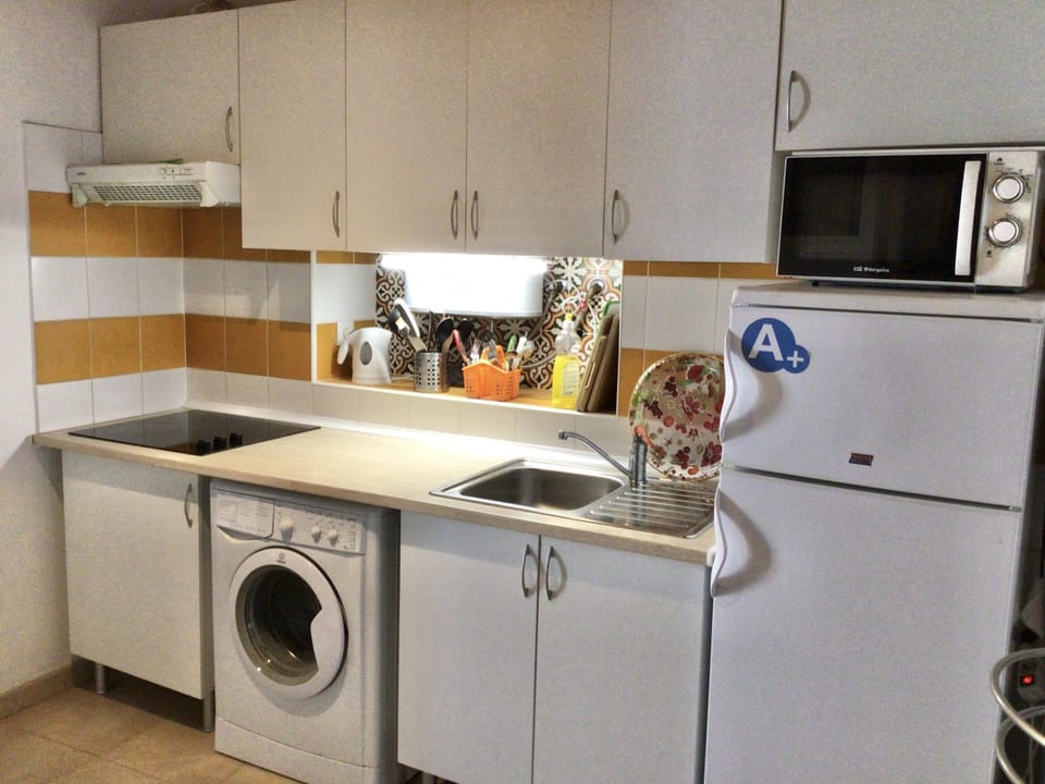 Kitchen has no dishwasher or oven.