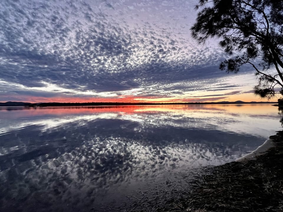 Dusk over Wallis Lake at your back door.