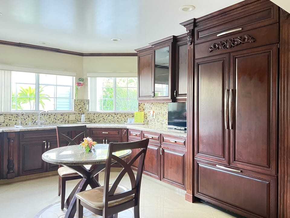 Kitchen island doubles as table. 