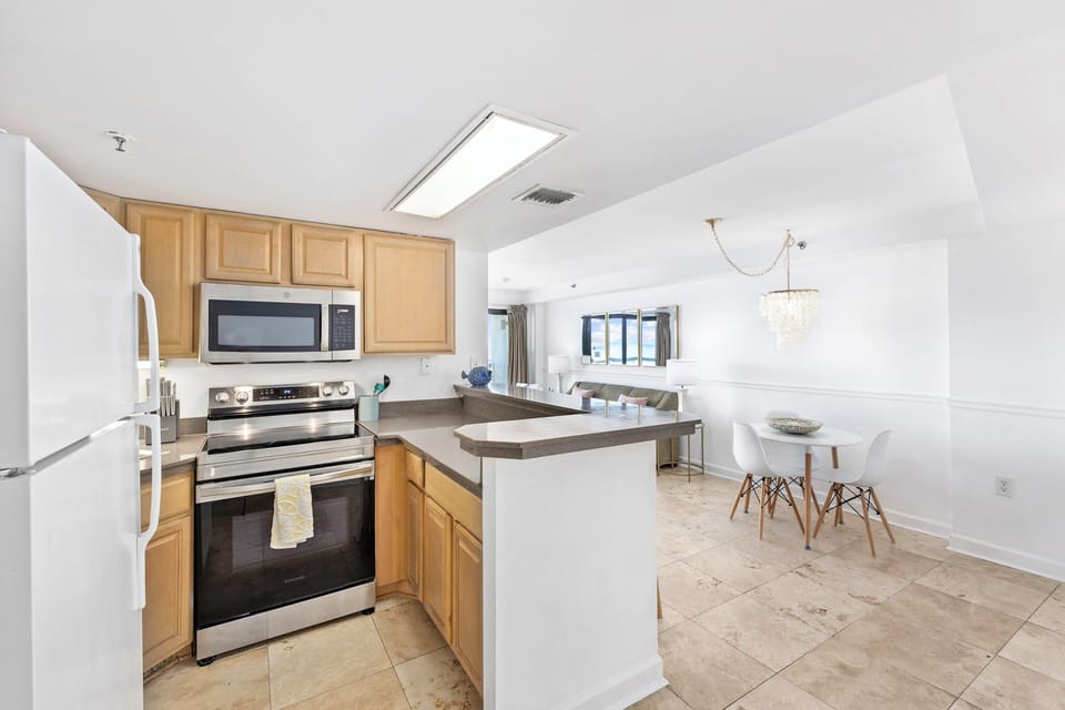 Brand new electric range, microwave and dishwasher in this cute kitchen. 