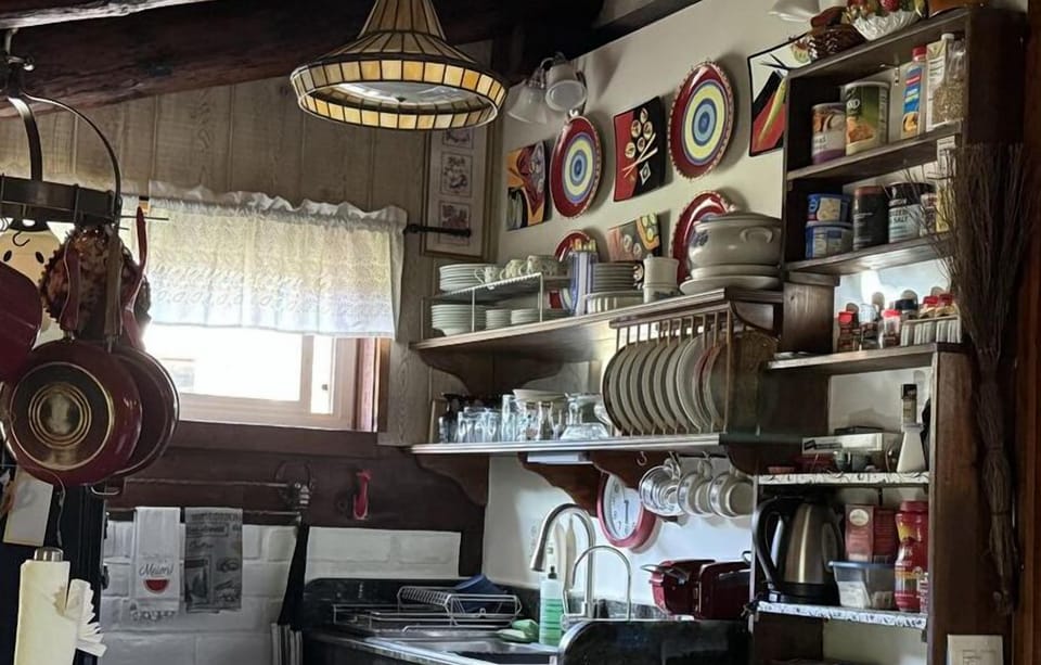 Fully stocked flatware, glasses/stemware, silverware and cooking utensils