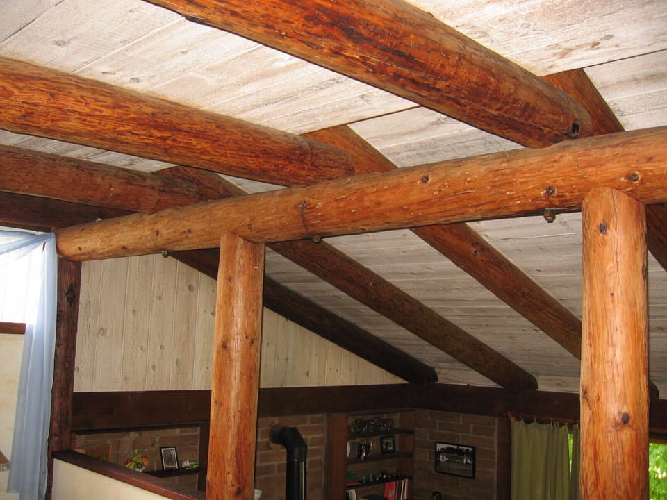 Post adobe style with custom woodwork