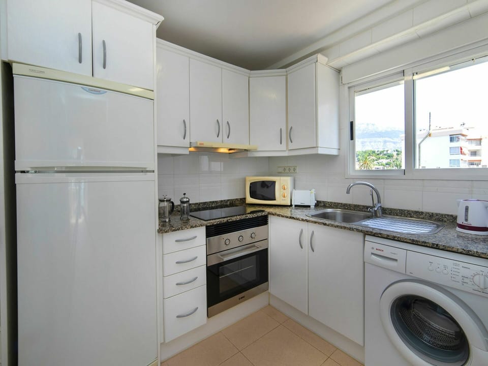 Laundry Room, Cabinetry, Property, Countertop, Clothes Dryer, Building, Washing Machine, Kitchen Appliance, Kitchen Stove, Kitchen Sink